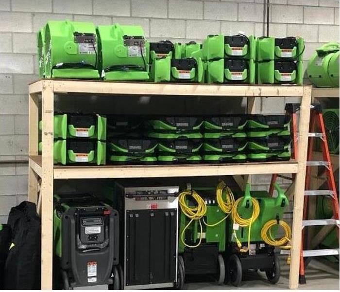 SERVPRO restoration equipment stacked in warehouse